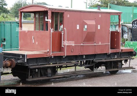 A Traditional Railway Guards Van On A Freight Train Stock Photo Alamy