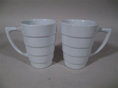 Lot 2 Frank Lloyd Wright Art Deco Guggenheim White Ceramic Coffee Cups