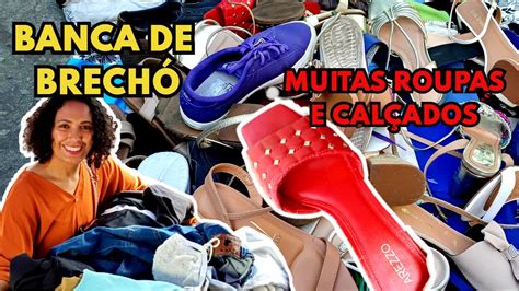 Uma Banca De Brech Lotada De Roupas E Cal Ados Maravilhosos Em Nova