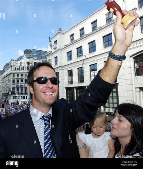 England Captain Michael Vaughan Lifts The Ashes On The Team Bus During