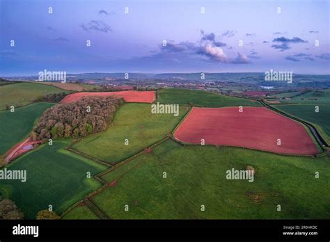 Sunset Over Fields And Farmlands In Spring From A Drone Devon England