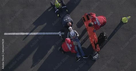 Emergency Road Injury And Aerial Of People On Stretcher For Accident