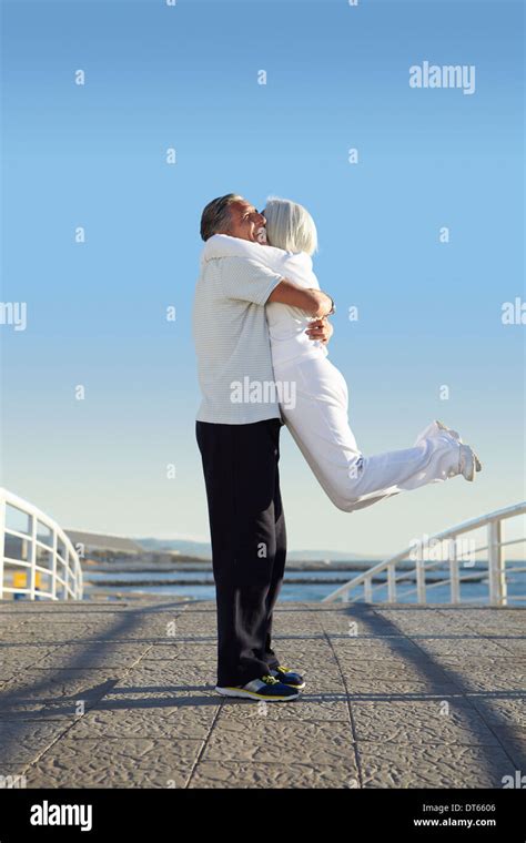 Man Lifting Woman Up High Resolution Stock Photography and Images - Alamy