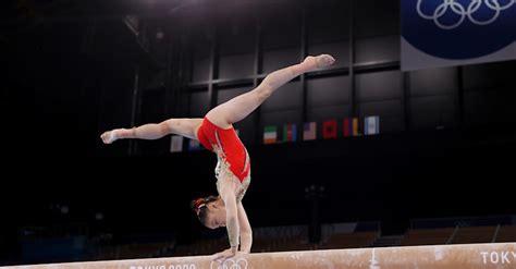 Team China performs on balance beam during qualifications at Tokyo 2020