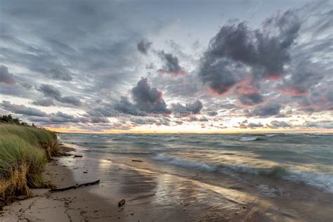 Lake Huron beach at sunset stock image. Image of county - 52572165