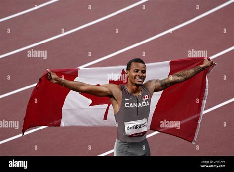 Canadas Andre De Grasse Celebrates After His Gold Medal Finish In The