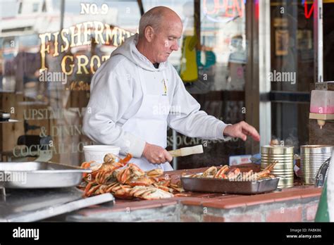 Chef Preparing Crab In Front Of Number Fisherman S Grotto Fisherman