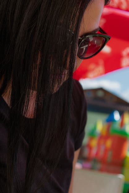 Premium Photo Close Up Of Woman Wearing Sunglasses