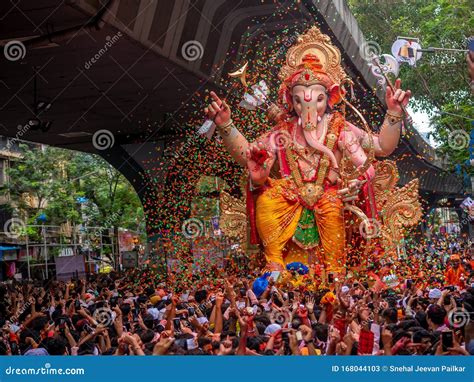 Thousands Of Devotees Bid Adieu To Tallest Lord Ganesha With Colors In