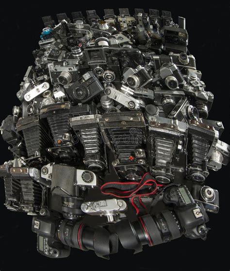 A Lot Of Cameras Stacked In A Big Pile Stock Photo Image Of Light