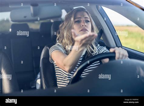 Angry Woman Driving A Car Stock Photo Alamy