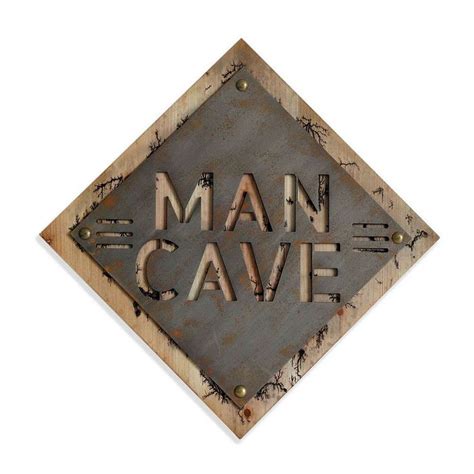 The Man Cave Sign Is Made Out Of Metal