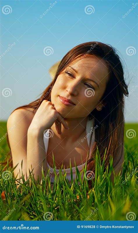 Charming Brunette Lying On The Grass Stock Photo Image Of Natural Healthy