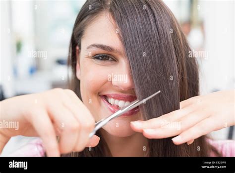 Pretty Brunette Getting Her Hair Cut Stock Photo Alamy