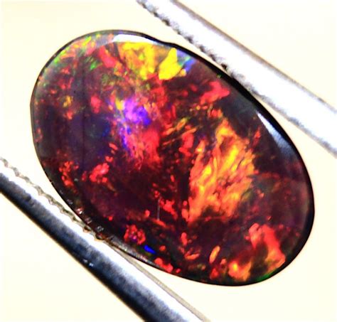 Cts 0 80 Natural Ethiopian Black Opal 1083 Mm 0 16 G Catawiki