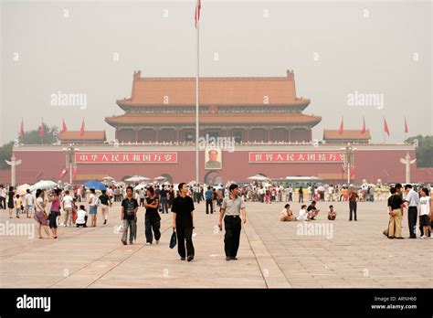 Tourists And Smog Pollution At The Forbidden City In Tiananmen Square