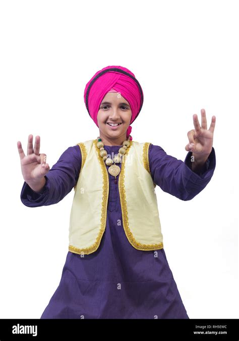 PORTRAIT OF A SIKH SARDAR YOUNG BOY DANCING THE BANGRA DANCE IN ...