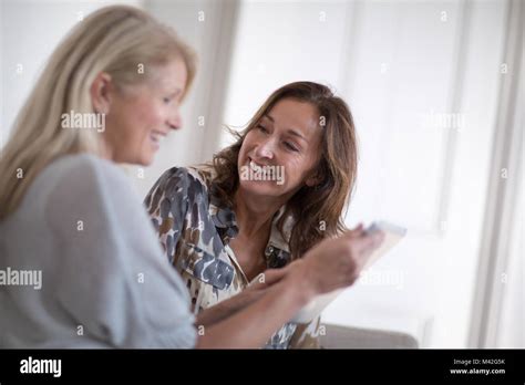 Mature Women Friends Laughing Home Hi Res Stock Photography And Images Alamy
