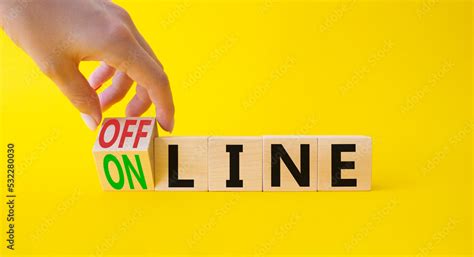 Offline And Online Symbol Businessman Hand Turnes Wooden Cubes And