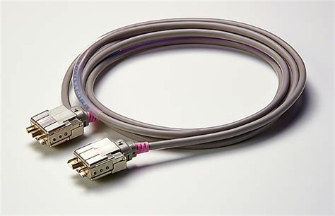 Two Cables Connected To A Computer Background Wire Cable Background