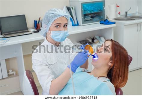 Female Dentist Fixed Dry Dental Fillings Stock Photo 1406933318