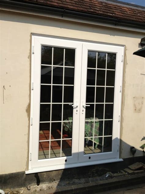 White Swiftframe Upvc French Doors With Georgian Bars Dorking Glass