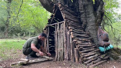 Build Cozy Bushcraft Survival Shelter In The Trunk Fireplace With Clay