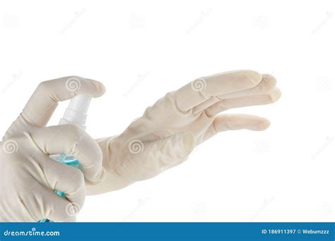 Hands In Sterile Rubber Gloves With Antiseptic Spray Isolated On White