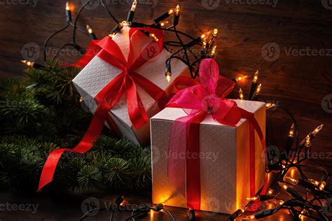 Christmas background with gift boxes and lights 16295526 Stock Photo at Vecteezy