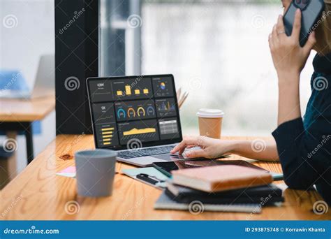 The Data Analyst Woman Working On A Business Analytics Dashboard Utilizing Charts And Metrics