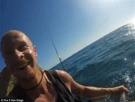 Fisherman Films Super Aggressive Hammerhead Shark Head Butting His