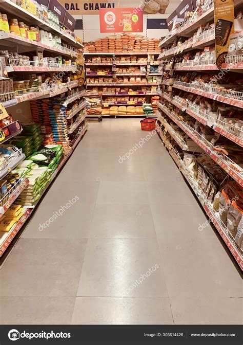 Products displayed on the shelves of a departmental store on sale ...