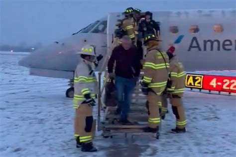 Firefighters Escort Passengers Off American Airlines Flight After Aircraft Slid Off Runway