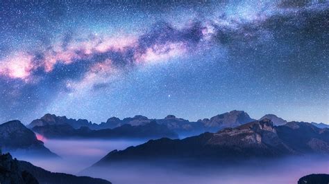 Milky Way Above Mountains In Fog At Night In Autumn Passo Giau