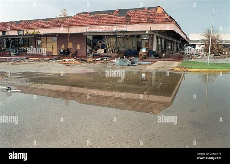 A view of damage to the Armed Forces Recruiting Center, caused by Hurricane Andrew. Subject ...