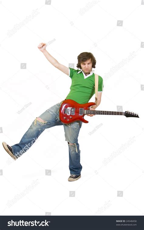 Passionate Guitar Player Playing His Guitar Wit One Hand In The Air