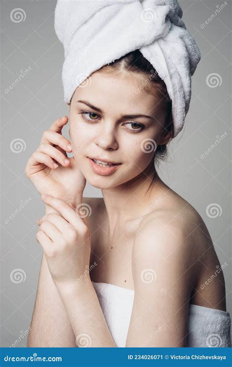 Woman After Shower With Towel On Head Posing Skin Care Stock Image