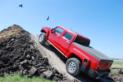 Off-Road: 2009 HUMMER H3T vs. The Competition - Hummer Guy