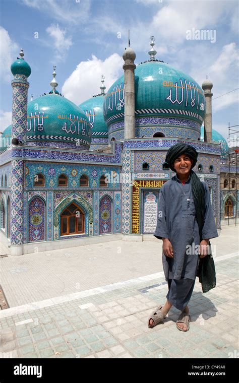 Afghan boy in front of a shia mosque in kabul Stock Photo - Alamy