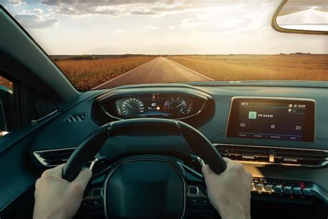 Premium Photo Driving Car Through A Perfect Road Fields Illuminated