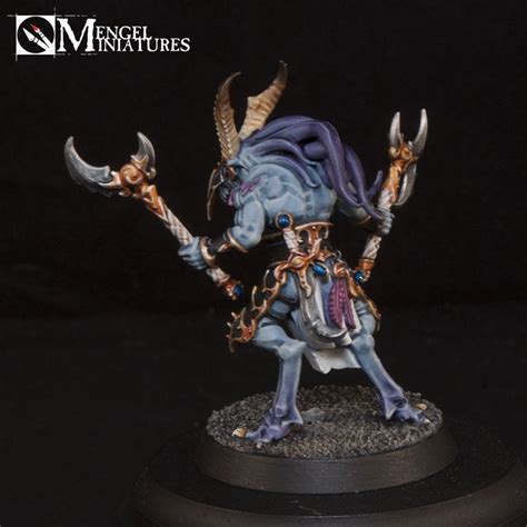 An Image Of A Miniature Figurine With Horns On Its Head And Arms