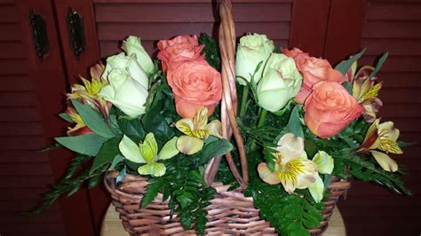 Basket arrangement of one dozen mixed roses in Bristol, PA | Bristol Florists