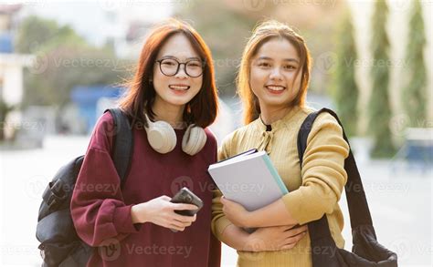 Portrait Of Two Beautiful Asian Female College Students At School