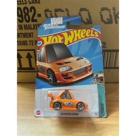 LeHuong Diecast Xe mô hình Hot Wheels 94 Toyota Supra Tooned Shopee Việt Nam