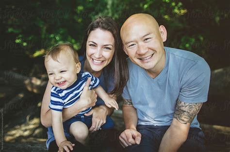 "Young Mixed-race (caucasian, Asian) Family Enjoying Each Other Outside ...