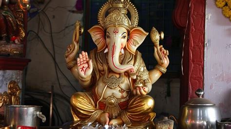 Premium Photo | Ganesh statue in the temple wallpaper Lord Ganesh