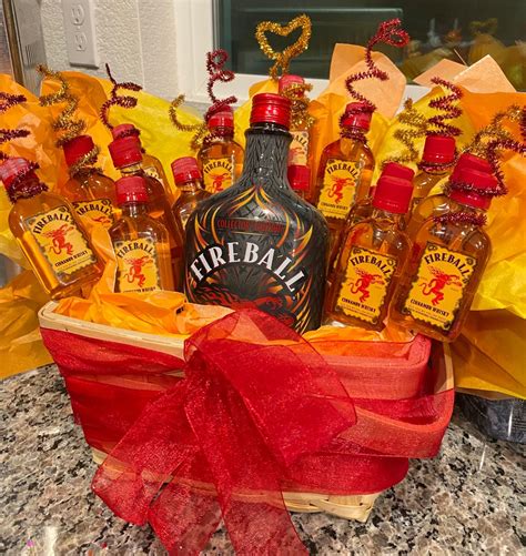 Fireball Whiskey Gift Basket with Red Ribbon and Yellow Wrapping