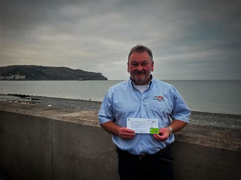 Llandudno RNLI lifeboat crew member rescues stranded seal pup | RNLI