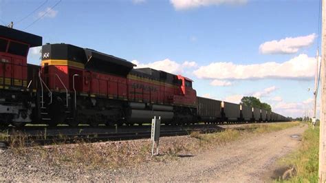 BNSF 9321 And BNSF 9151 With UP 7180 Lead Trains Albia IA W Canon