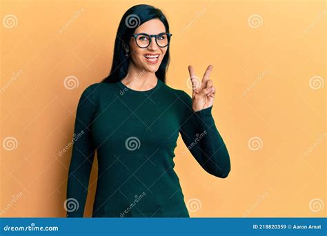 Young Caucasian Woman Wearing Casual Clothes And Glasses Smiling With